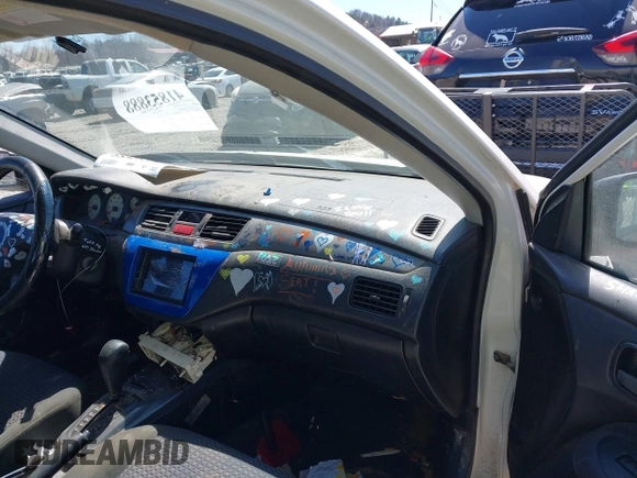 2002 Mitsubishi Lancer OZ-Rally with VIN JA3AJ86E42U039140, listed as a IAAI auction lot 41853888 with 328,181 mi miles and . Bid and sale history available at DreamBid. Image 5.