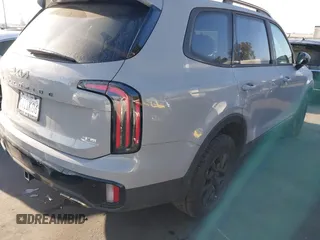 2025 Kia Telluride SX-Prestige X-Line with VIN 5XYP5DGCXSG579857, listed as a IAAI auction lot 42213332 with 4,738 mi miles and . Bid and sale history available at DreamBid. Image 4.