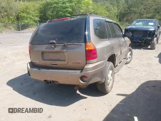 2003 GMC Envoy SLT with VIN 1GKDS13S832208655, listed as a IAAI auction lot 42076668 with 160,787 mi miles. Bid and sale history available at carsss.com. Image 4.