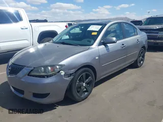 2006 Mazda Mazda3 i with VIN JM1BK12G161465537, listed as a IAAI auction lot 42074144 with 167,823 mi miles. Bid and sale history available at carsss.com. Image 2.