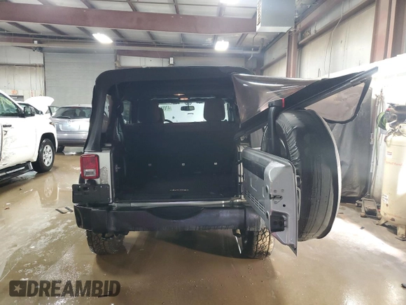 2014 Jeep Wrangler Unlimited Sport with VIN 1C4BJWDG9EL140263, listed as a Copart auction lot 47652785 with 39,493 mi miles and Salvage Title. Bid and sale history available at DreamBid. Image 6.