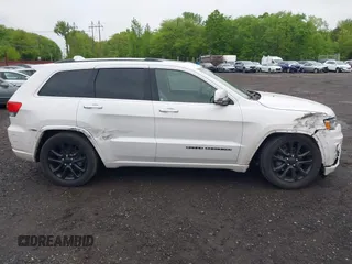 2018 Jeep Grand Cherokee High Altitude z VIN 1C4RJFCG7JC216122, wystawiony jako IAAI lot #42221311 z przebiegiem 121 852 mil mil oraz . Historia ofert i sprzedaży dostępna na DreamBid. Obrazek 13.