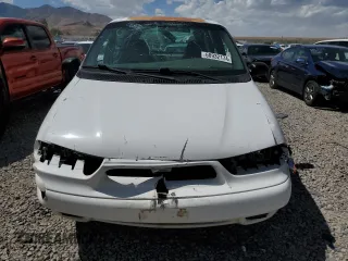 1998 Ford Windstar z VIN 2FTDA54U5WBB50718, wystawiony jako Copart lot #68932174 z przebiegiem 57 879 mil mil oraz Tytuł czysty. Historia ofert i sprzedaży dostępna na DreamBid. Obrazek 5.