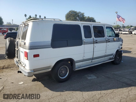 1990 Chevrolet Chevy Van z VIN 1GBEG25K0L7167885, wystawiony jako Copart lot #72575264 z przebiegiem 231 827 mil mil oraz Szkoda całkowita • Salvage title. Historia ofert i sprzedaży dostępna na DreamBid. Obrazek 3.