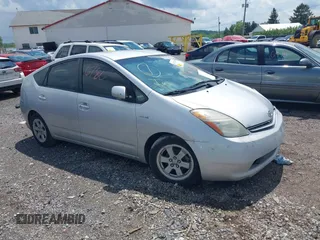 2007 Toyota Prius z VIN JTDKB20U677677900, wystawiony jako IAAI lot #42176780 z przebiegiem 246 442 mil mil oraz . Historia ofert i sprzedaży dostępna na DreamBid. Obrazek 1.
