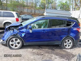2016 Ford Escape SE z VIN 1FMCU0G90GUB57287, wystawiony jako IAAI lot #42170920 z przebiegiem 76 703 mil mil oraz . Historia ofert i sprzedaży dostępna na DreamBid. Obrazek 14.