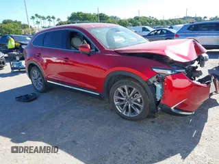 2023 Mazda CX-9 Grand Touring with VIN JM3TCBDY7P0632706, listed as a IAAI auction lot 41003307 with 44,221 mi miles and . Bid and sale history available at carsss.com. Image 1.