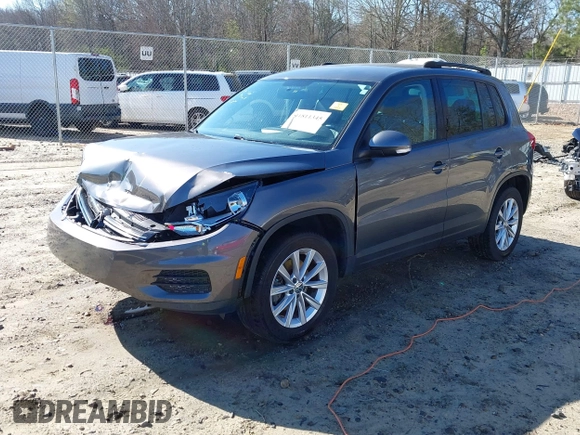 2014 Volkswagen Tiguan SE z VIN WVGAV3AX0EW511694, wystawiony jako IAAI lot #41811345 z przebiegiem 95 129 mil mil oraz . Historia ofert i sprzedaży dostępna na DreamBid. Obrazek 17.