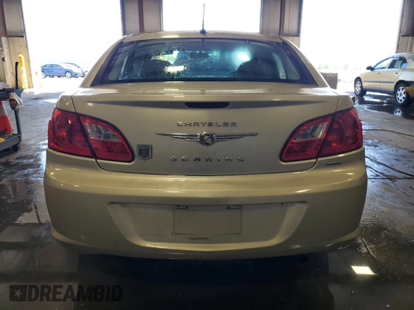 2010 Chrysler Sebring Touring with VIN 1C3CC4FB2AN183821, listed as a Copart auction lot 55239615 with 26,094 mi miles and Salvage Title. Bid and sale history available at DreamBid. Image 6.