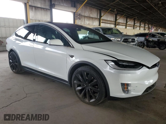 2018 Tesla Model X 75D with VIN 5YJXCBE23JF133589, listed as a Copart auction lot 55573715 with 89,234 mi miles and Salvage Title. Bid and sale history available at DreamBid. Image 4.