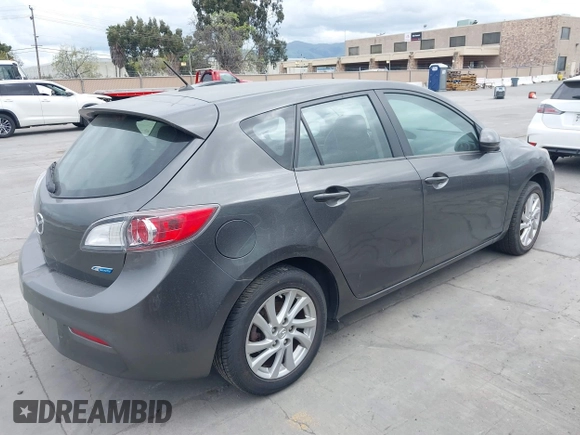 2012 Mazda Mazda3 i Touring with VIN JM1BL1L82C1696088, listed as a IAAI auction lot 41872228 with 111,629 mi miles. Bid and sale history available at carsss.com. Image 4.