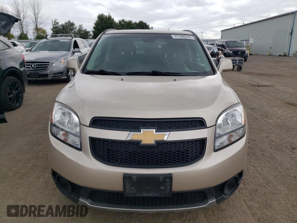 2012 Chevrolet Orlando 1LT z VIN KL77P2EMXCK561796, wystawiony jako Copart lot #75188244 z przebiegiem 131 868 mil mil oraz Tytuł czysty. Historia ofert i sprzedaży dostępna na DreamBid. Obrazek 5.