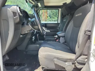 2016 Jeep Wrangler Unlimited Sahara с VIN 1C4HJWEG3GL346528, выставлен на аукционе Copart как лот 65092755 с пробегом 127 393 миль миль и Списание • Salvage title. История ставок и продаж доступна на DreamBid. Изображение 7.