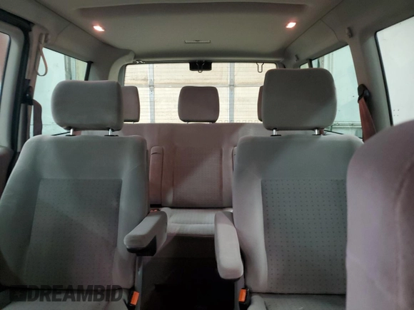 2003 Volkswagen EuroVan с VIN WV2KB47053H044308, выставлен на аукционе Copart как лот 81267494 с пробегом 174 679 миль миль и Чистый • Clean title. История ставок и продаж доступна на DreamBid. Изображение 10.