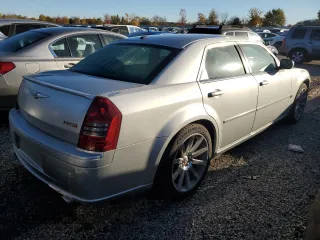 2006 Chrysler 300 C SRT8 with VIN 2C3LA73W06H471013, listed as a Copart auction lot 74204434 with 12,015 mi miles and Salvage Title. Bid and sale history available at carsss.com. Image 3.