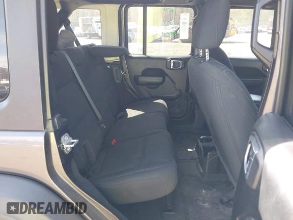 2021 Jeep Wrangler Unlimited Willys with VIN 1C4HJXDG1MW672507, listed as a IAAI auction lot 42084805 with 59,943 mi miles and . Bid and sale history available at DreamBid. Image 8.