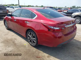 2018 Nissan Altima SR with VIN 1N4AL3AP9JC195613, listed as a IAAI auction lot 42131986 with 83,256 mi miles and . Bid and sale history available at carsss.com. Image 3.