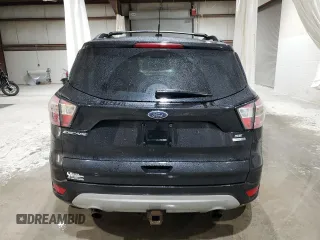 2017 Ford Escape SE with VIN 1FMCU9G96HUE03765, listed as a Copart auction lot 51468405 with 96,963 mi miles and Salvage Title. Bid and sale history available at carsss.com. Image 6.