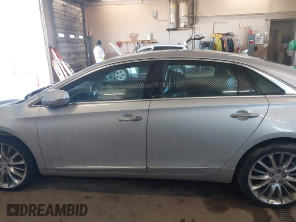 2013 Cadillac XTS Platinum with VIN 2G61V5S31D9190738, listed as a IAAI auction lot 41657461 with 136,924 mi miles and . Bid and sale history available at carsss.com. Image 15.