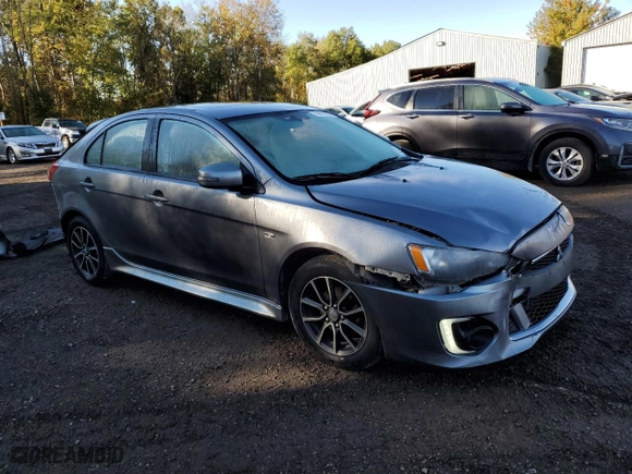 2017 Mitsubishi Lancer Sportback ES with VIN JA32X2HUXHU600647, listed as a Copart auction lot 74891304 with 169,676 mi miles and Salvage Title. Bid and sale history available at carsss.com. Image 4.