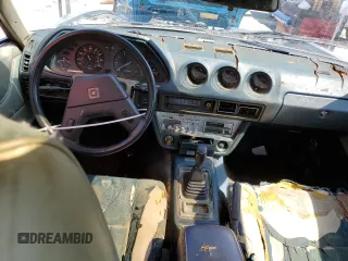 1981 Datsun 280ZX z VIN JN1HZ04S2BX268405, wystawiony jako Copart lot #65626714 z przebiegiem 94 507 mil mil oraz Tytuł czysty. Historia ofert i sprzedaży dostępna na DreamBid. Obrazek 8.