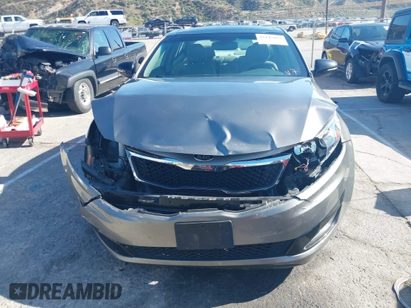2013 Kia Optima EX z VIN 5XXGN4A70DG252497, wystawiony jako IAAI lot #42145025 z przebiegiem 90 867 mil mil oraz . Historia ofert i sprzedaży dostępna na DreamBid. Obrazek 13.