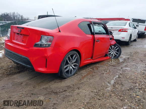 2015 Scion tC z VIN JTKJF5C79FJ013303, wystawiony jako IAAI lot #41581714 z przebiegiem Nie podano mil oraz . Historia ofert i sprzedaży dostępna na DreamBid. Obrazek 4.