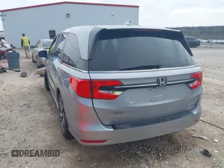 2021 Honda Odyssey Touring with VIN 5FNRL6H8XMB034837, listed as a IAAI auction lot 41856444 with 84,950 mi miles. Bid and sale history available at carsss.com. Image 3.