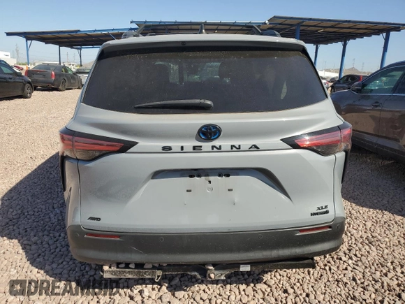 2022 Toyota Sienna XLE Woodland Edition with VIN 5TDASKFC4NS043580, listed as a Copart auction lot 74021884 with 153,893 mi miles and Salvage Title. Bid and sale history available at carsss.com. Image 6.