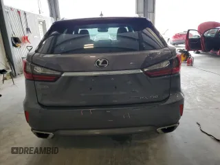 2016 Lexus RX 350 with VIN 2T2BZMCA1GC038794, listed as a Copart auction lot 64048765 with 114,205 mi miles and Salvage title. Bid and sale history available at DreamBid. Image 6.