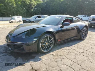 2021 Porsche 911 Carrera with VIN WP0AA2A93MS206806, listed as a Copart auction lot 58923294 with 25,088 mi miles and Salvage Title. Bid and sale history available at carsss.com. Image 1.