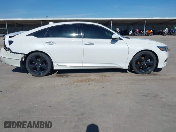 2018 Honda Accord Touring z VIN 1HGCV1F96JA144076, wystawiony jako IAAI lot #41561688 z przebiegiem 125 539 mil mil oraz . Historia ofert i sprzedaży dostępna na DreamBid. Obrazek 13.