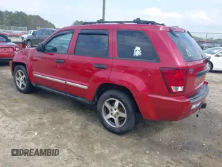 2005 Jeep Grand Cherokee Laredo with VIN 1J4HS48N95C711992, listed as a IAAI auction lot 41944696 with 209,299 mi miles and . Bid and sale history available at DreamBid. Image 3.