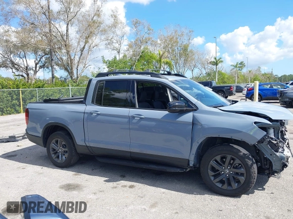 2023 Honda Ridgeline Sport z VIN 5FPYK3F13PB067936, wystawiony jako IAAI lot #41535175 z przebiegiem 27 503 mil mil oraz . Historia ofert i sprzedaży dostępna na DreamBid. Obrazek 14.
