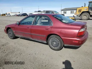 1996 Honda Accord LX with VIN 1HGCD563XTA266206, listed as a Copart auction lot 48601005 with 302,329 mi miles and Salvage Title. Bid and sale history available at DreamBid. Image 2.