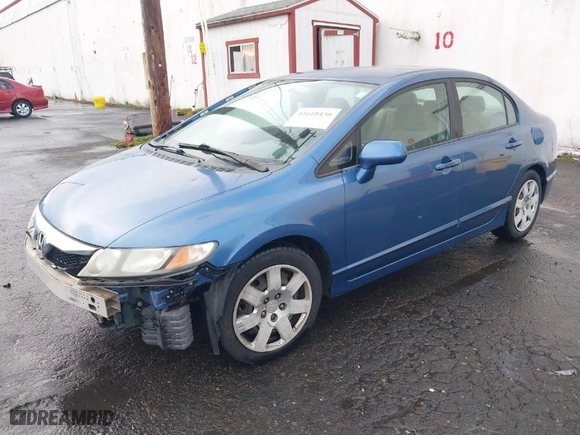 2010 Honda Civic Sdn LX with VIN 19XFA1F53AE043207, listed as a IAAI auction lot 41618430 with 122,421 mi miles. Bid and sale history available at carsss.com. Image 2.