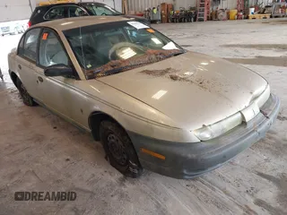 1996 Saturn SL с VIN 1G8ZG5281TZ117924, выставлен на аукционе IAAI как лот 42669030 с пробегом 167 735 миль миль и . История ставок и продаж доступна на DreamBid. Изображение 1.