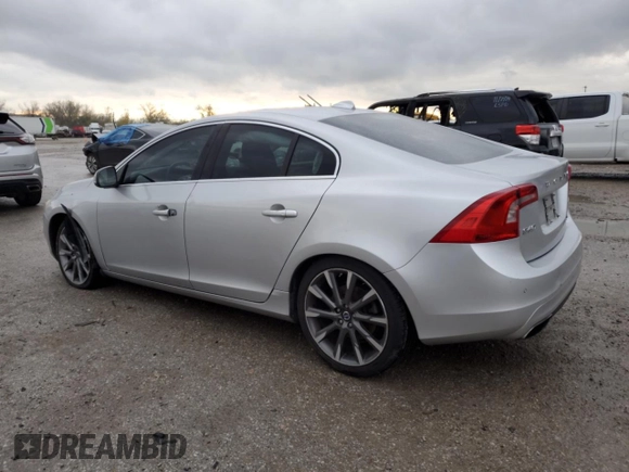 2015 Volvo S60 T6 Drive-E Platinum with VIN YV149MFMXF2335458, listed as a Copart auction lot 80777934 with 140,790 mi miles and Salvage title. Bid and sale history available at DreamBid. Image 2.