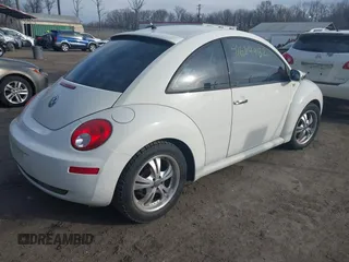2008 Volkswagen New Beetle Coupe Triple White with VIN 3VWFW31C78M521404, listed as a IAAI auction lot 41624482 with 143,418 mi miles. Bid and sale history available at carsss.com. Image 4.