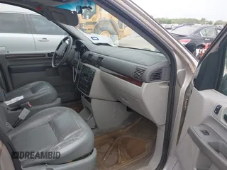 2006 Ford Freestar SEL z VIN 2FMZA52216BA05064, wystawiony jako IAAI lot #42058806 z przebiegiem 157 991 mil mil oraz . Historia ofert i sprzedaży dostępna na DreamBid. Obrazek 5.