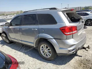 2017 Dodge Journey SXT z VIN 3C4PDDBG1HT578238, wystawiony jako Copart lot #61497045 z przebiegiem 132 179 mil mil oraz Szkoda całkowita • Salvage title. Historia ofert i sprzedaży dostępna na DreamBid. Obrazek 2.