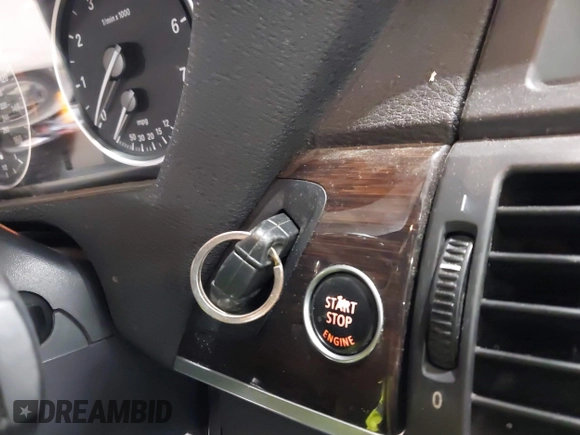 2012 BMW X5 50i with VIN 5UXZV8C50CL425721, listed as a IAAI auction lot 42590676 with 192,355 mi miles and . Bid and sale history available at DreamBid. Image 11.