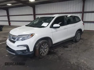 2021 Honda Pilot EX-L with VIN 5FNYF5H57MB022843, listed as a IAAI auction lot 41186957 with 57,836 mi miles. Bid and sale history available at carsss.com. Image 17.