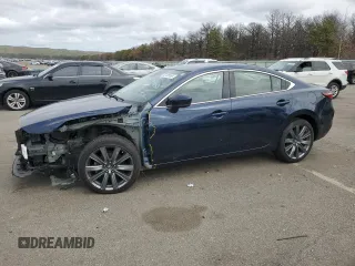 2018 Mazda 6 Grand Touring with VIN JM1GL1TY6J1323672, listed as a Copart auction lot 52700165 with 34,005 mi miles and Salvage Title. Bid and sale history available at DreamBid. Image 1.