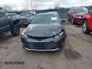 2018 Toyota Avalon XLE with VIN 4T1BK1EB9JU275097, listed as a IAAI auction lot 41940585 with 119,854 mi miles and . Bid and sale history available at DreamBid. Image 12.