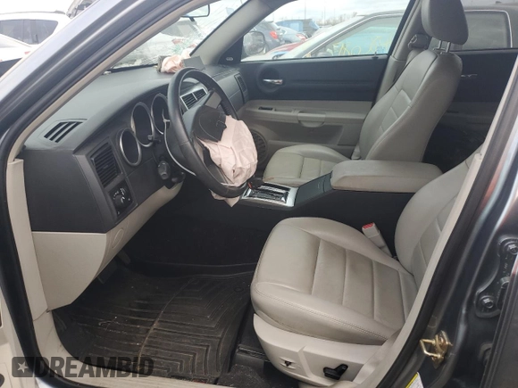 2006 Dodge Magnum R/T z VIN 2D4GZ572X6H537393, wystawiony jako Copart lot #76594084 z przebiegiem 81 078 mil mil oraz Szkoda całkowita • Salvage title. Historia ofert i sprzedaży dostępna na DreamBid. Obrazek 7.