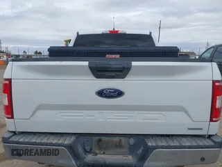 2018 Ford F-150 XL with VIN 1FTEW1EG2JKD10883, listed as a IAAI auction lot 41921828 with 156,780 mi miles. Bid and sale history available at carsss.com. Image 16.