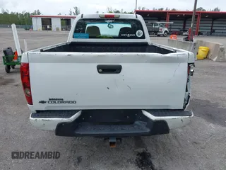 2009 Chevrolet Colorado Work Truck z VIN 1GCCS199798133352, wystawiony jako IAAI lot #42178500 z przebiegiem 166 648 mil mil oraz . Historia ofert i sprzedaży dostępna na DreamBid. Obrazek 6.