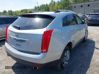 2016 Cadillac SRX Luxury Collection with VIN 3GYFNEE37GS559537, listed as a IAAI auction lot 42246889 with 102,261 mi miles and . Bid and sale history available at DreamBid. Image 4.
