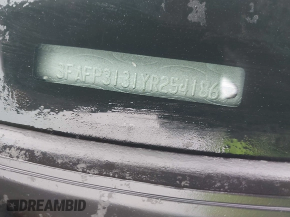 2000 Ford Focus ZX3 with VIN 3FAFP3131YR254186, listed as a IAAI auction lot 42049619 with Not provided miles and . Bid and sale history available at DreamBid. Image 12.